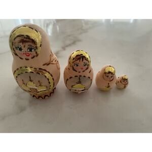 Four Vintage Russian Wood Nesting Dolls 4" brown gold.